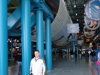 Joe being dwarfed by Saturn 5 Rocket